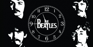 Часы на холсте The Beatles 25х50
